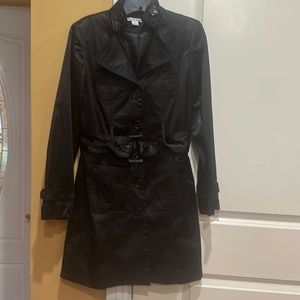 Gorgeous black satin blazer with many details .  New condition.